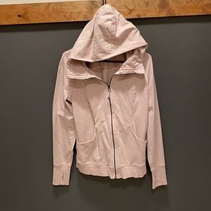 Lululemon zip up hoodie in good used condition. Heather pink color.